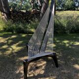 Harp style armchair