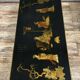 Chinese coffee table in black lacquer and colored mother-of-pearl decorations