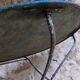 Ancienne table de jardin ronde en fer