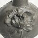 Art Nouveau, a single flower vase jug in pewter signed Petiz around 1900.