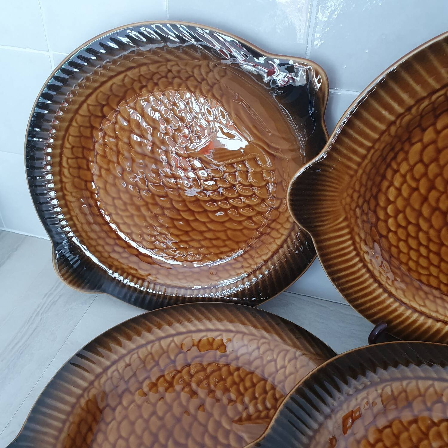 Sarreguemines / 11 earthenware fish-shaped plates