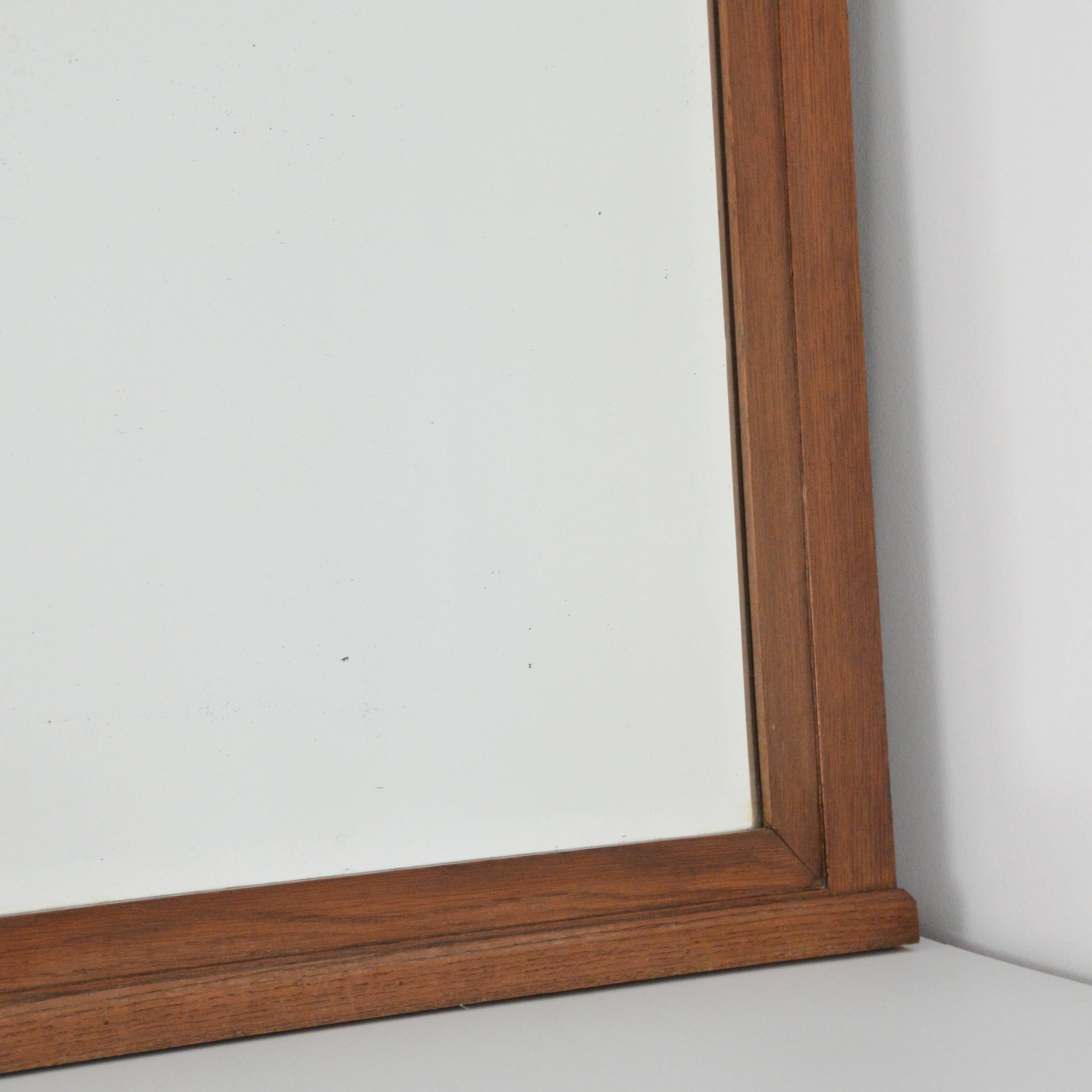 Bevelled Art Nouveau mirror in oak, vintage 1920.