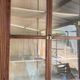 Pair of teak colonial-style bookshelves / display cabinets.