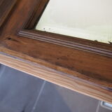 Old pediment mirror carved in wood