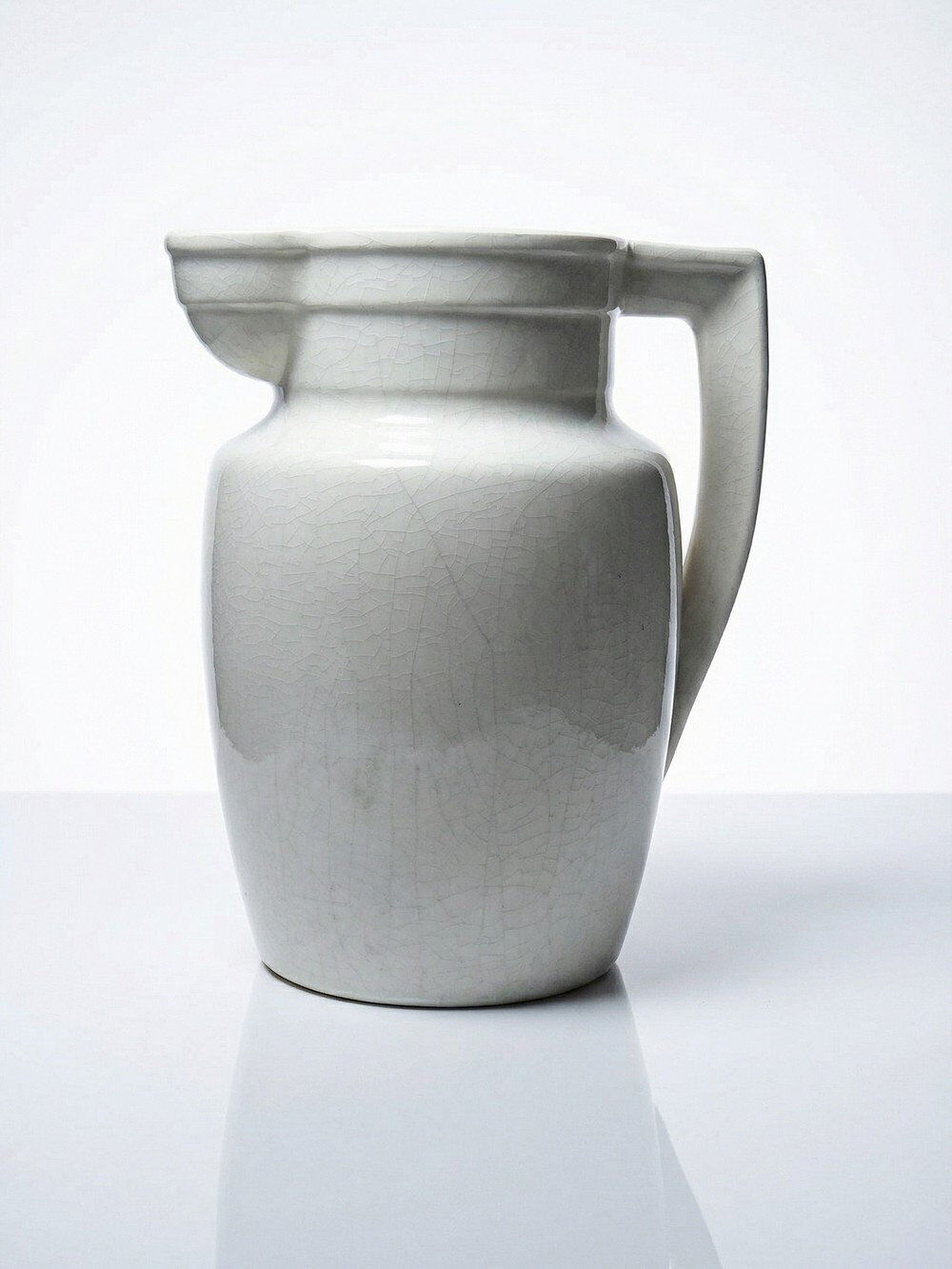 Large Art Deco toilet bowl, antique cracked faience.