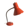 Lamp on flexible tangerine-laquered metal