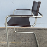 Fauteuil en cuir ancien