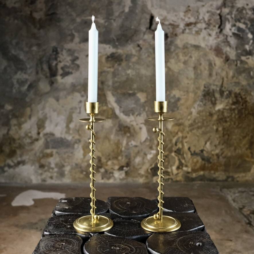 Pair of Art Deco twisted brass candlesticks, France, 1930s