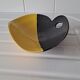 Yellow and black two-tone pocket cut Louviers