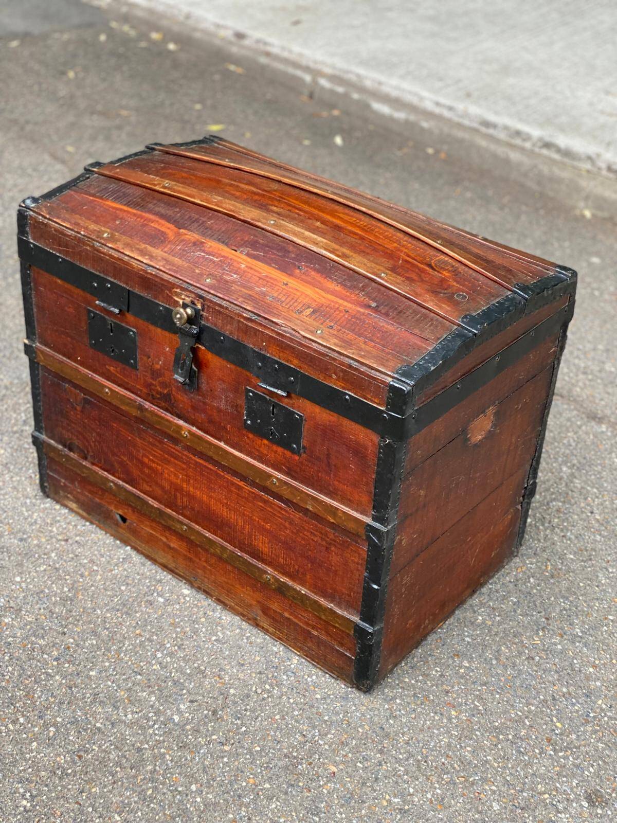 Vintage domed travel trunk from the 19th century.