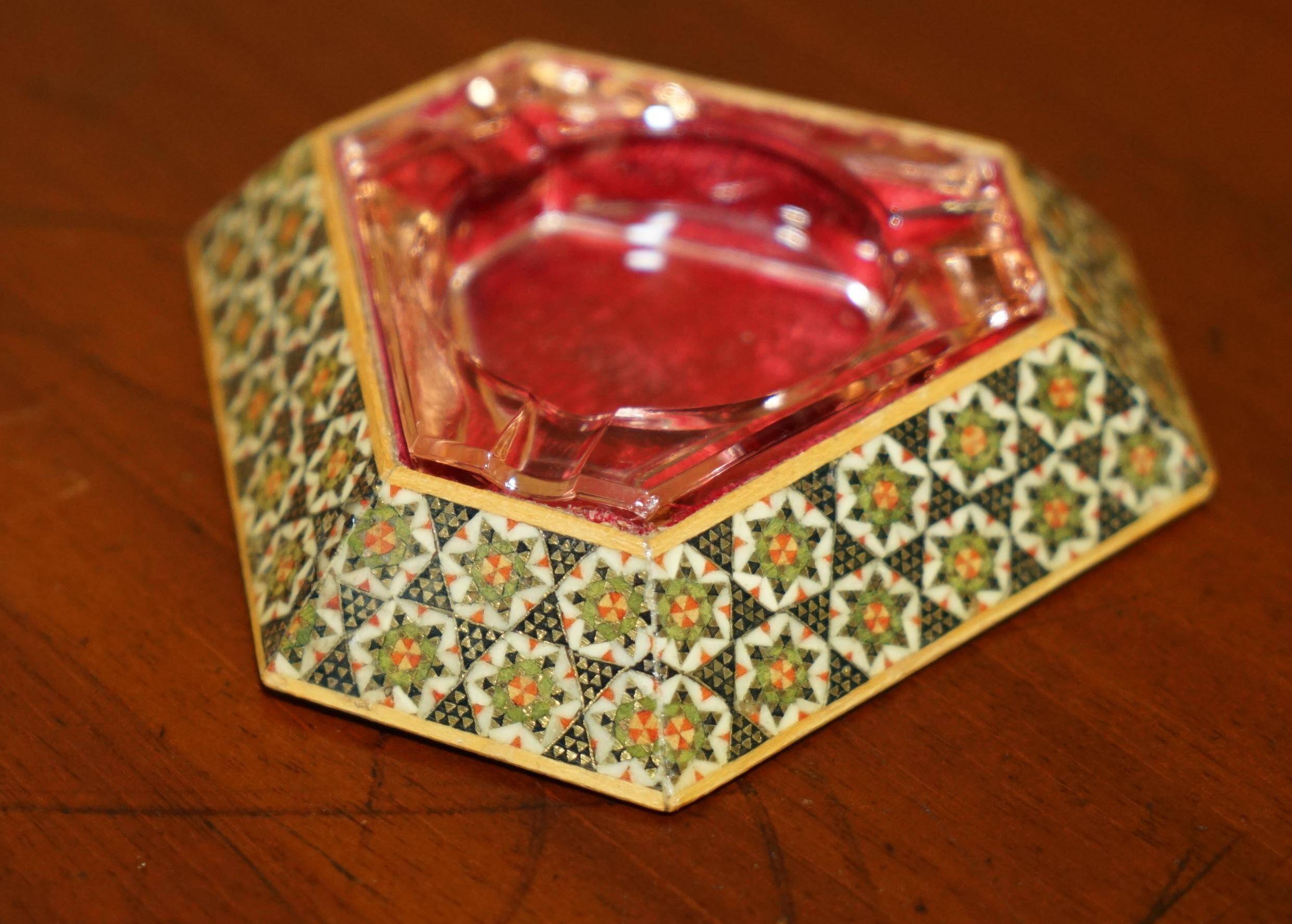 Antique Persian ashtray with triangular glass tray.