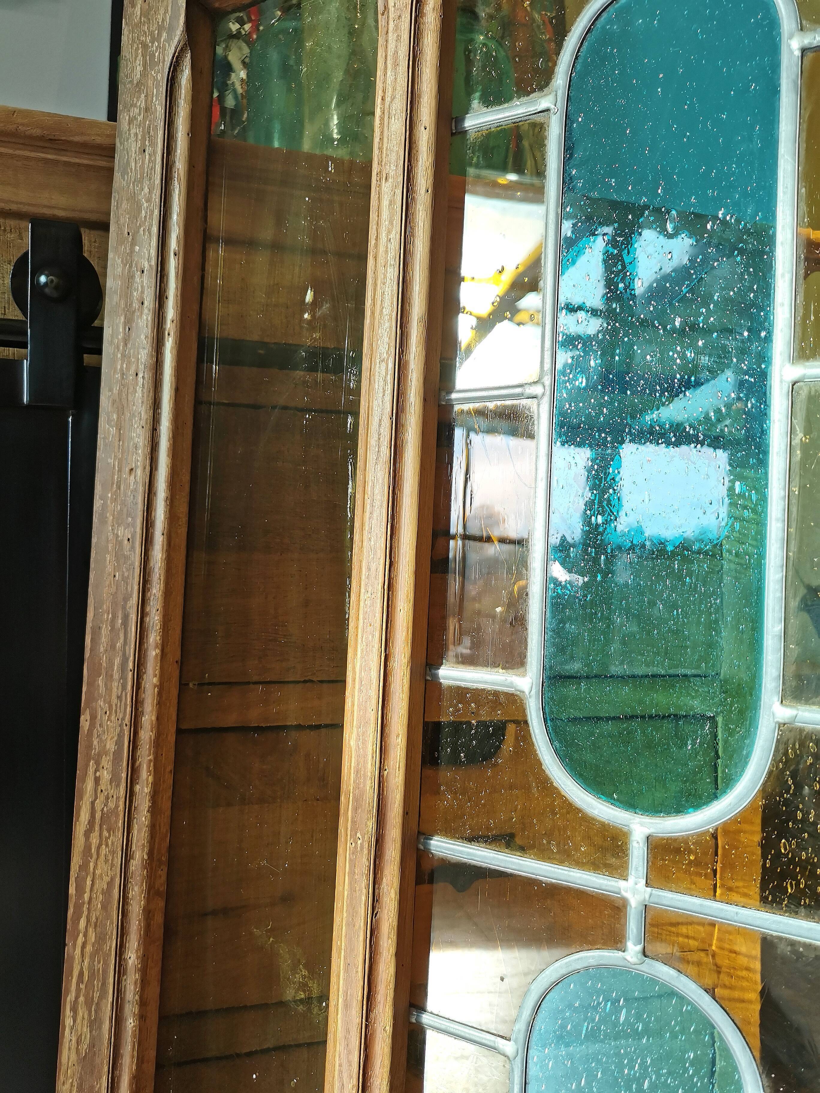 Stained glass window with framing