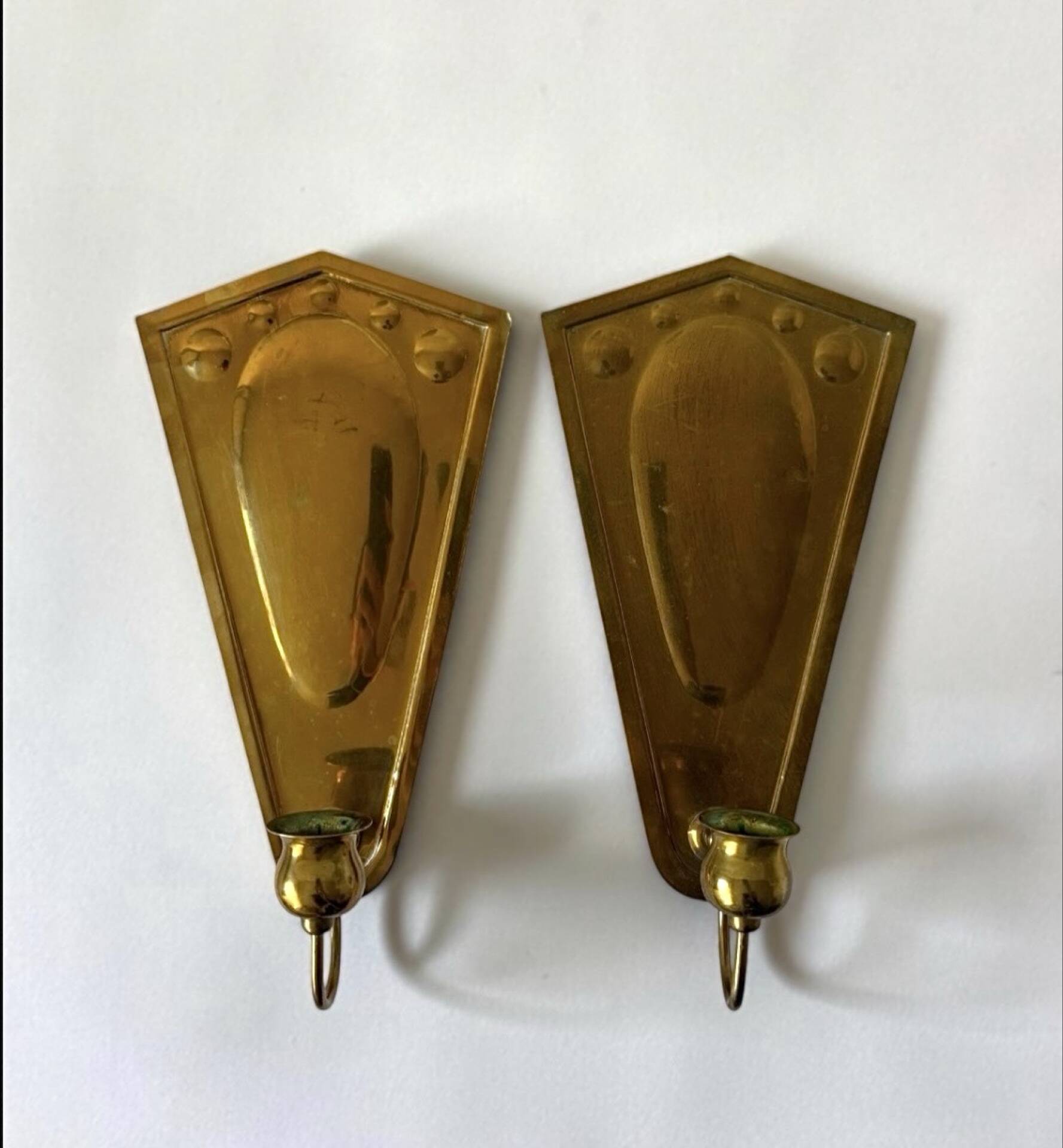 Scandinavian wall candle holders in brass