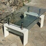 Coffee table in tempered glass and white metal.