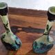 Pair of flower vases in glass paste, with a long slender neck.