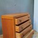 Commode vintage à 4 tirroirs pieds compas