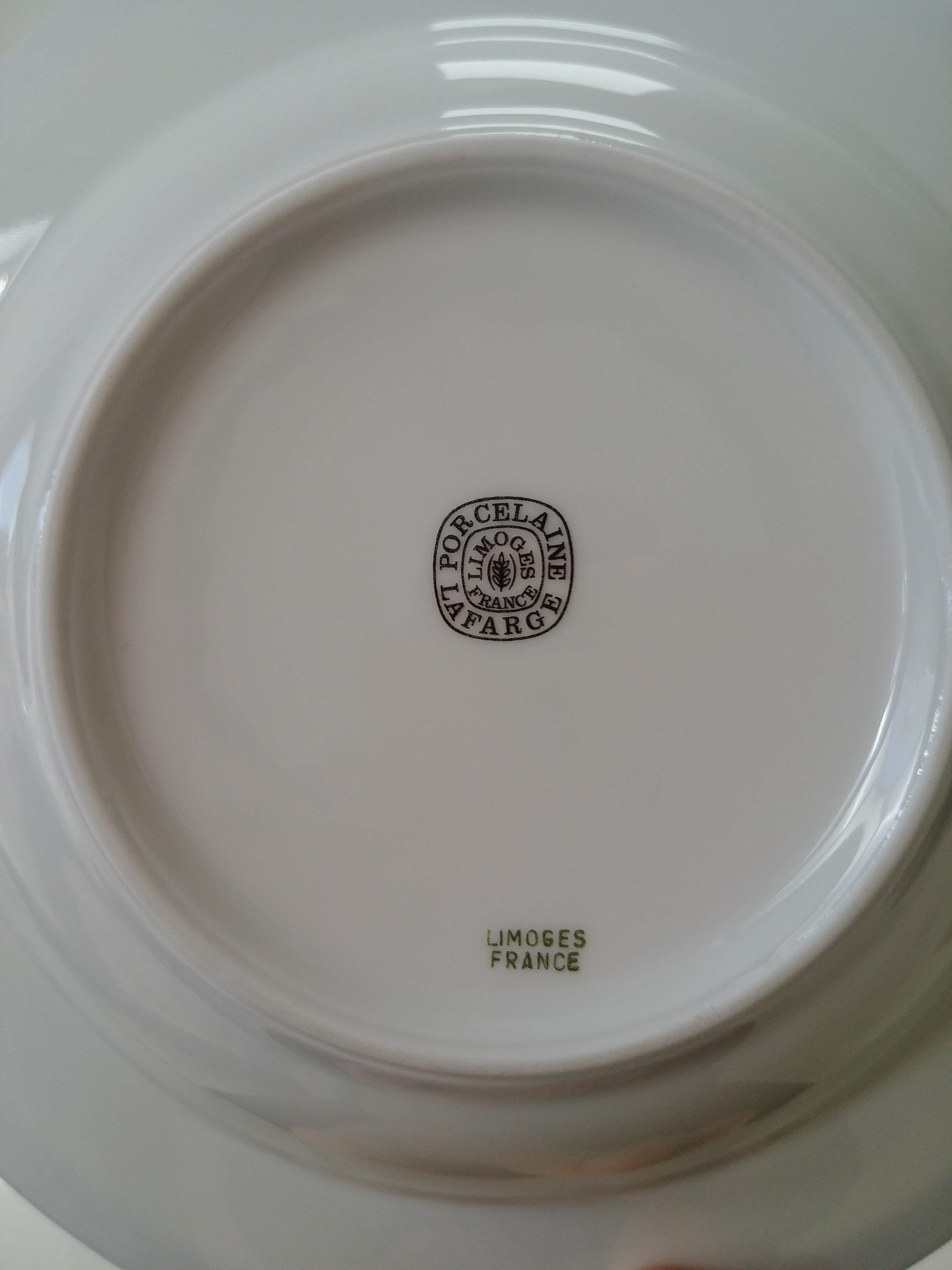 8 Limoges plates