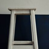 Old white wooden handle stool