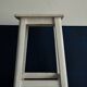 Old white wooden handle stool