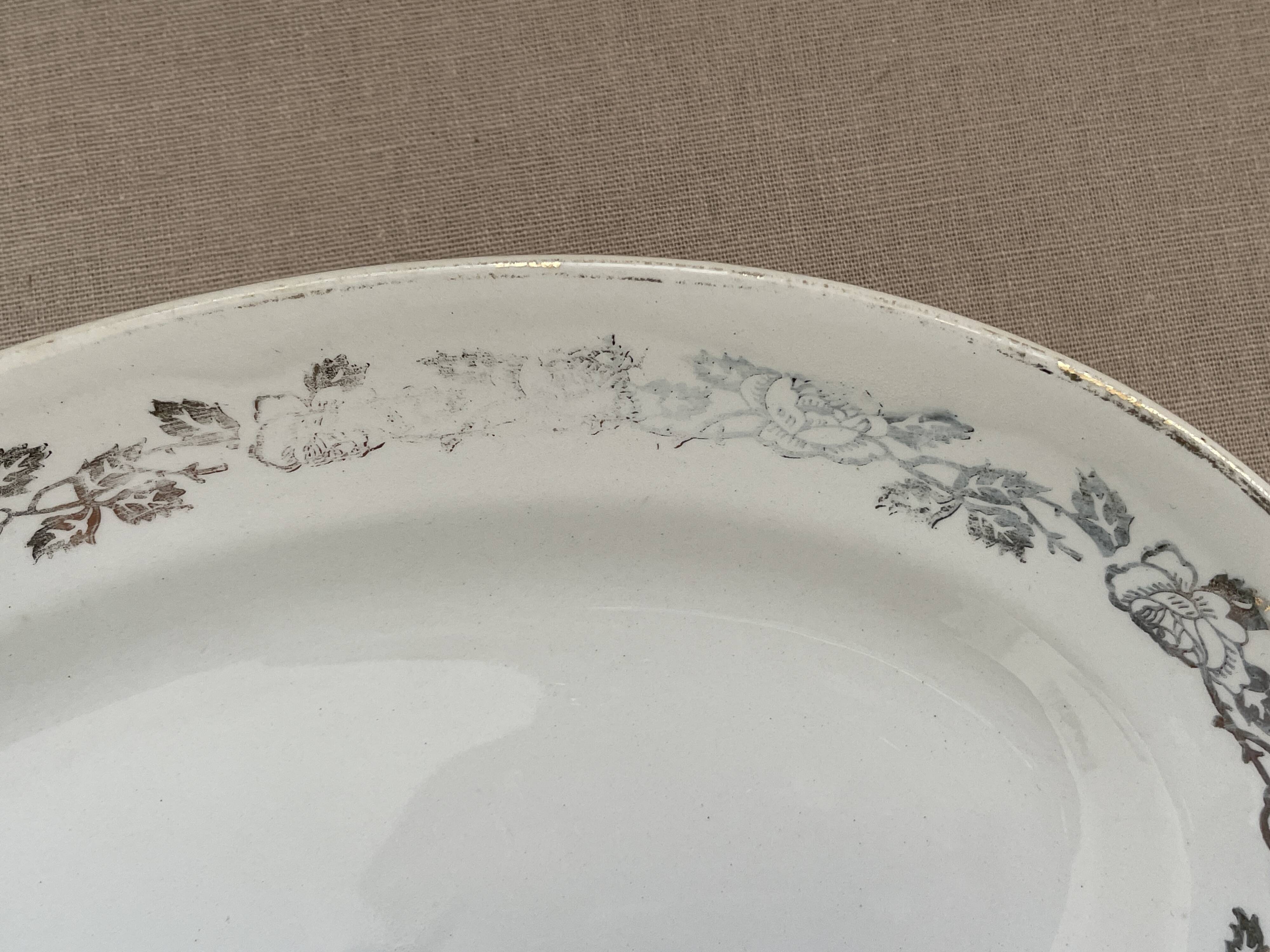 Antique oval plate Moulin des Loups Orchies – grey and gold floral decoration