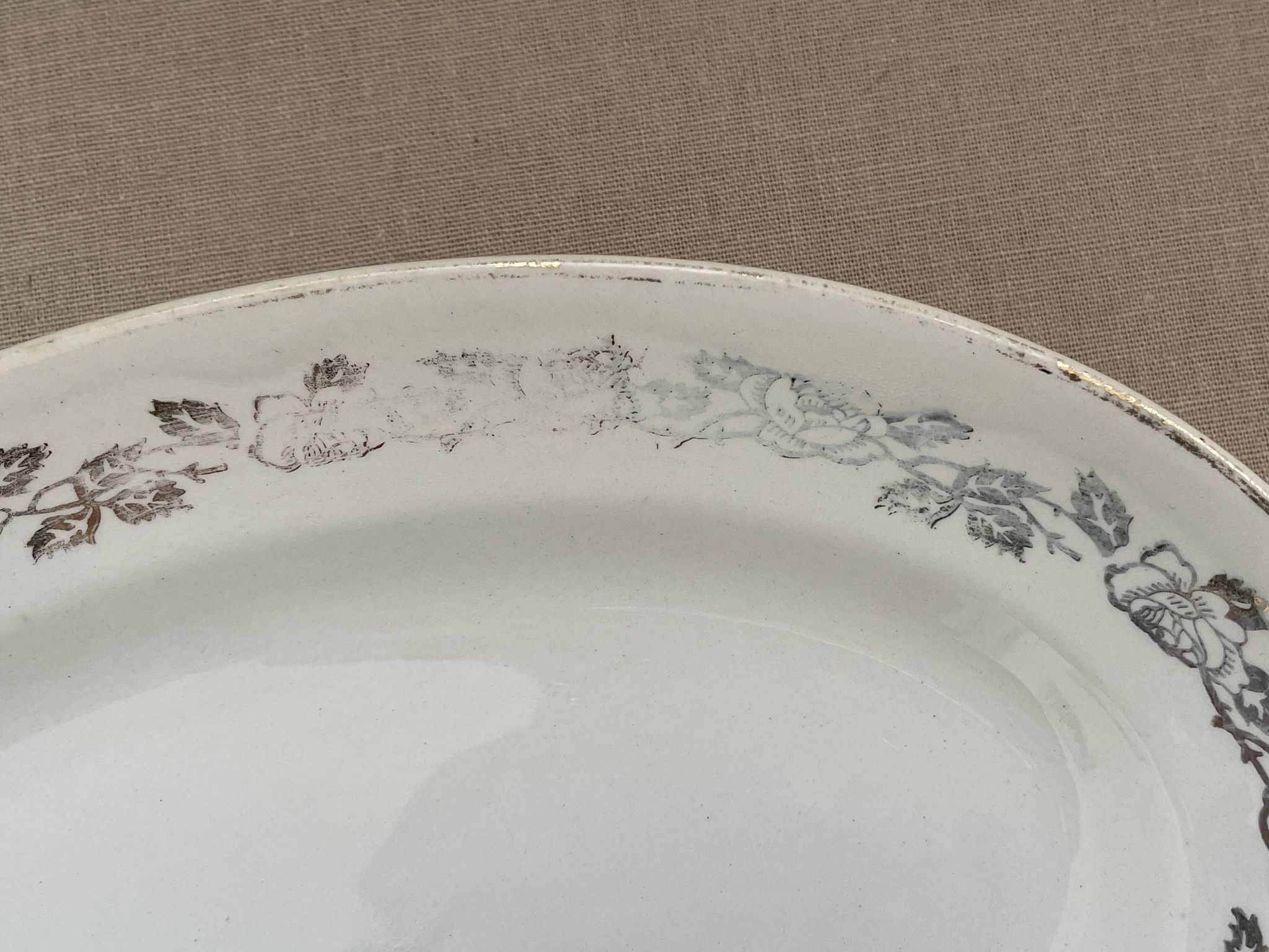 Antique oval plate Moulin des Loups Orchies – grey and gold floral decoration