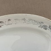 Antique oval plate Moulin des Loups Orchies – grey and gold floral decoration