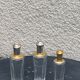 Three bottles of crystal perfume signed Marcel Rochas old france