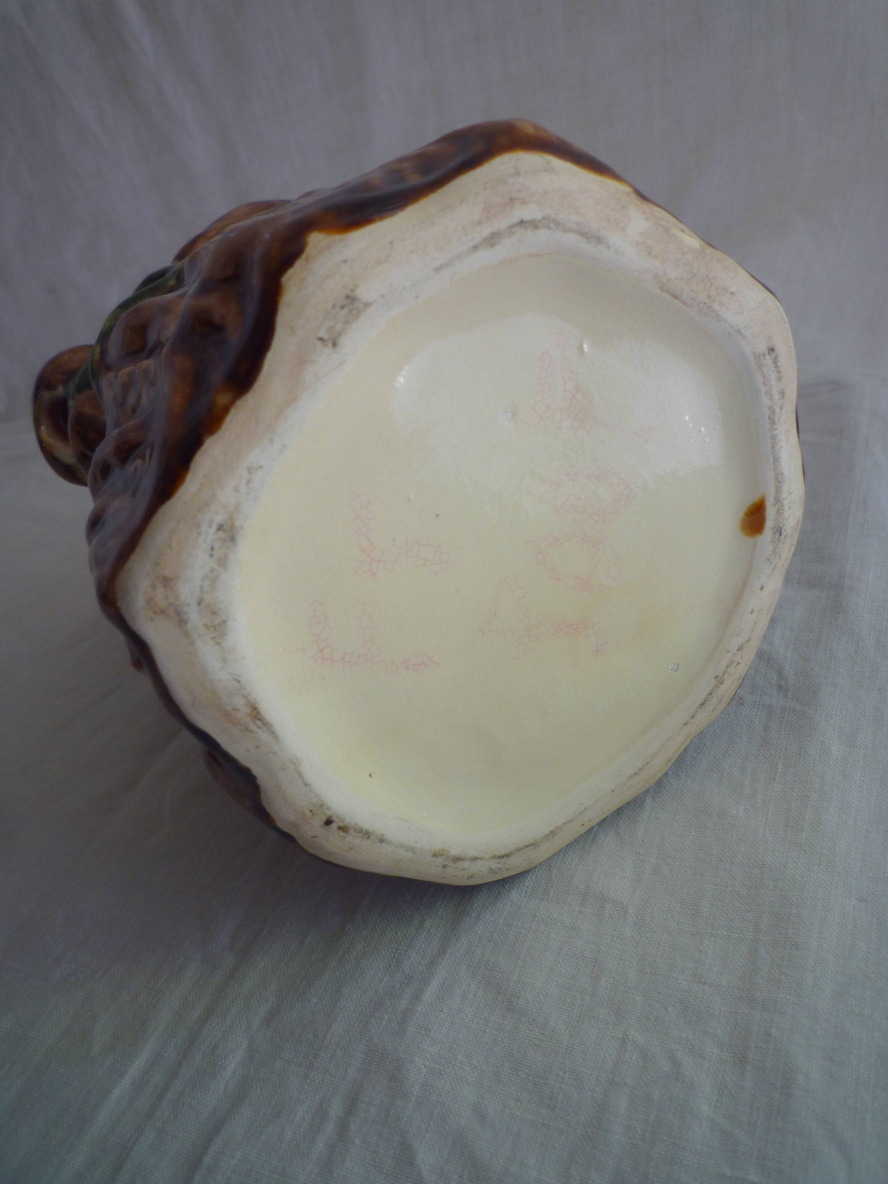 Lion head slip pitcher late 19th century