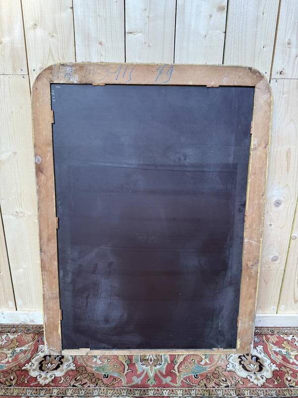 Miroir époque Louis Philippe à la feuille d'or.