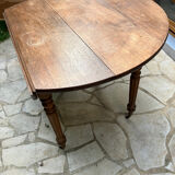 Round oak table with shutters