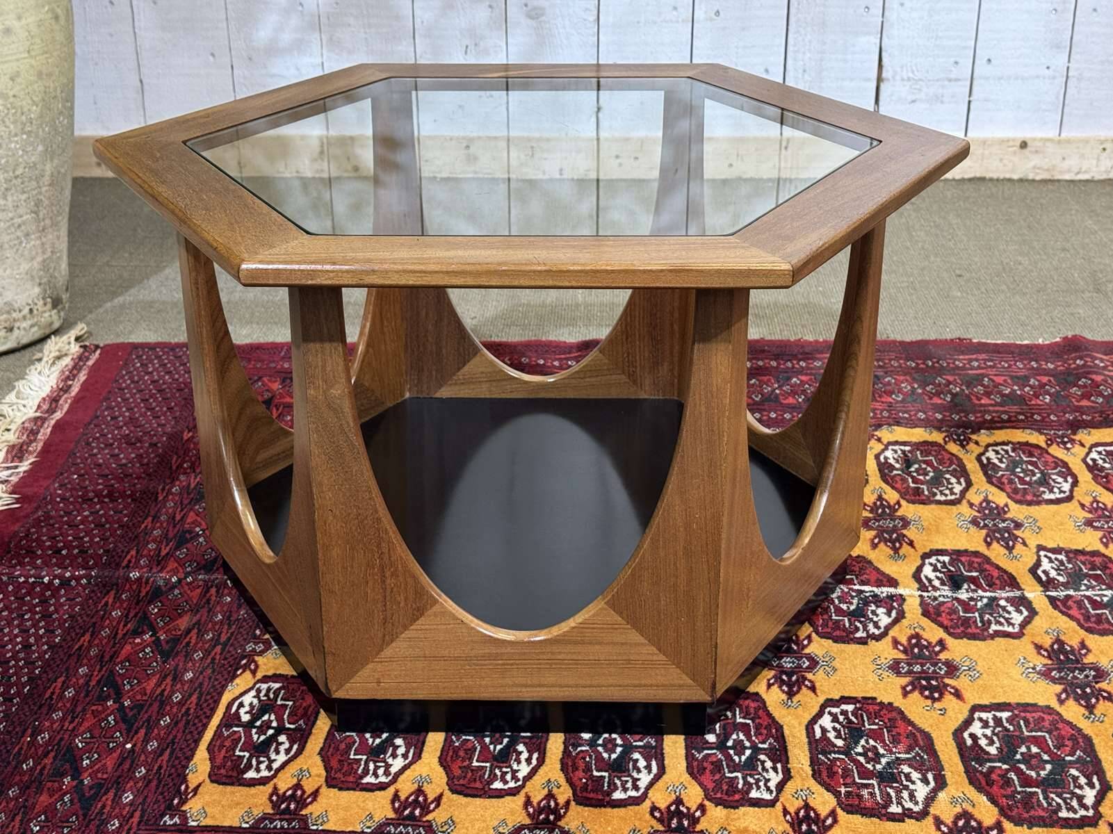 1970s octagonal GPlan gueridon in teak with a glass top.