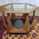 1970s octagonal GPlan gueridon in teak with a glass top.