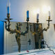 St Louis XV wall lights in solid gilded bronze with curved branches.