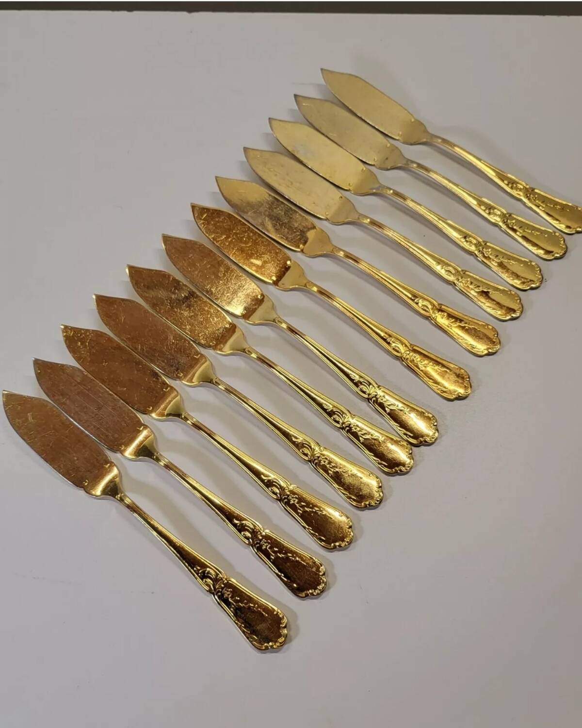 Gold metal fish cutlery, knives and forks 24 pieces