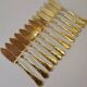 Gold metal fish cutlery, knives and forks 24 pieces