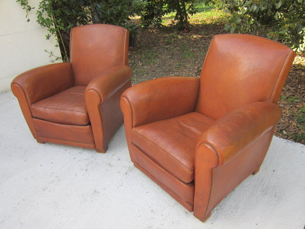 Paire de fauteuils club en cuir