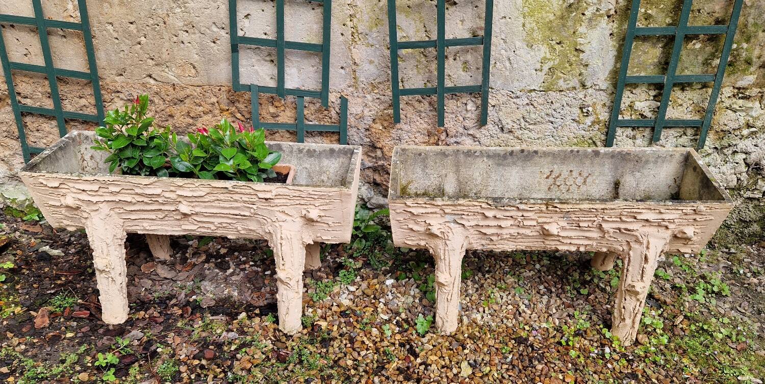 Pair of cement planters in faux wood finish