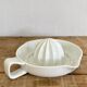 Citrus press with handle, earthenware spouts