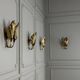 Set of four gilt brass wall lights, Tommaso Barbi, circa 1960.