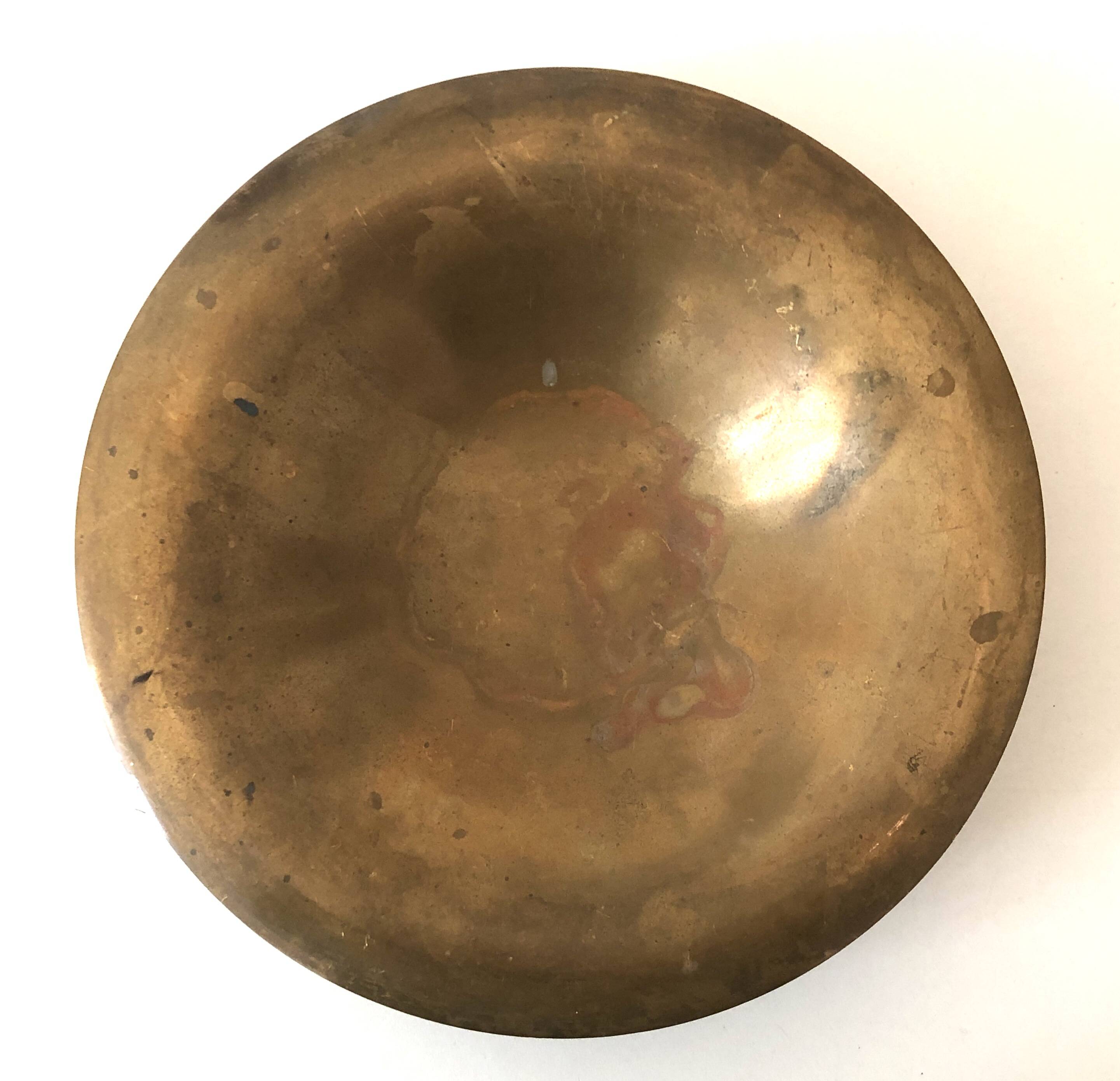 Old golden brass fruit bowl