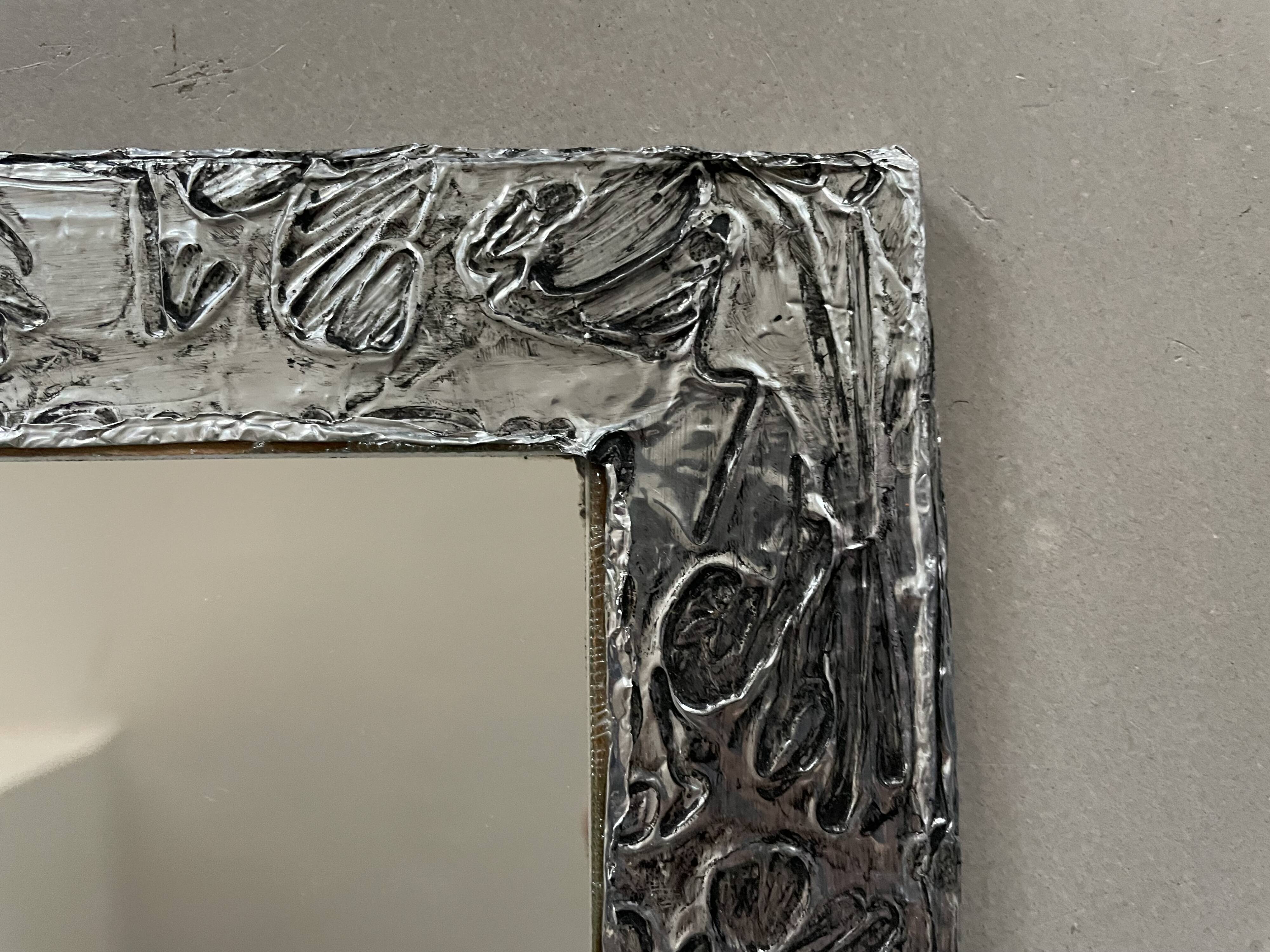 Vintage stamped mirror