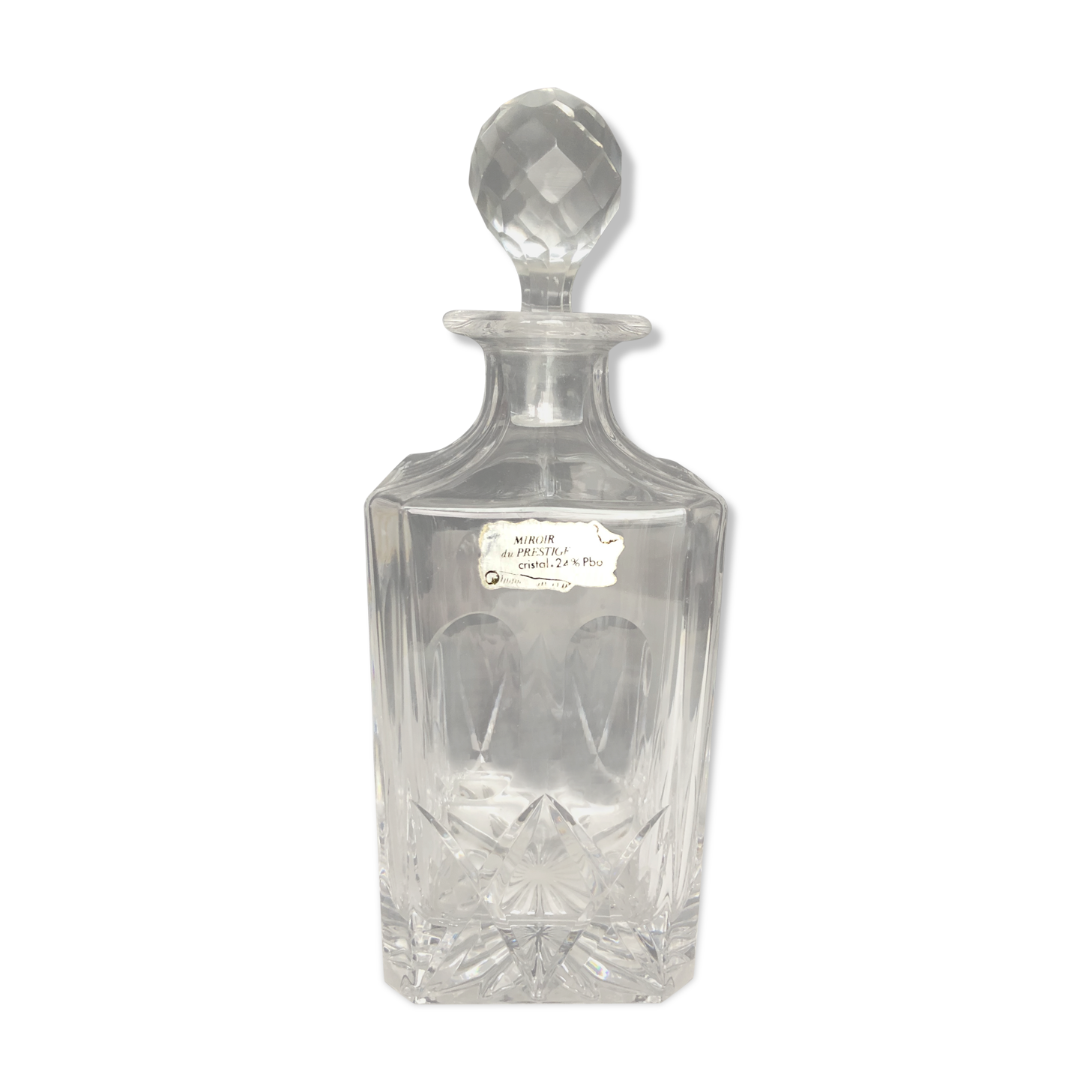 Carved crystal decanter