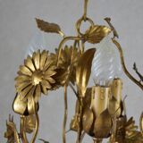 golden chandeliers with flowers.