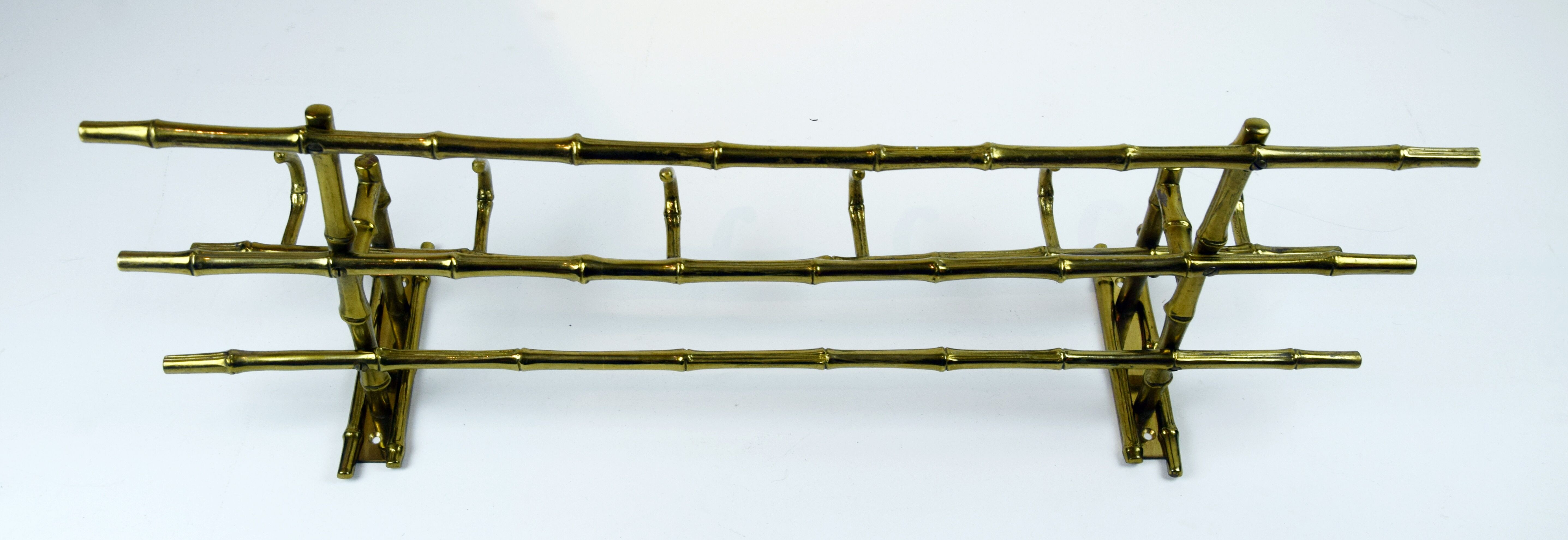 Bamboo-like coat rack in bronze