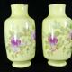 Pair of Limoges porcelain vases decorated with rose bushes