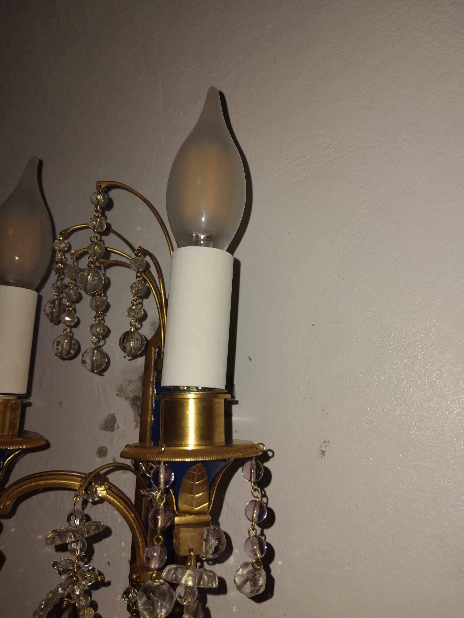 Pair of Louis XVI style gilt bronze wall lights