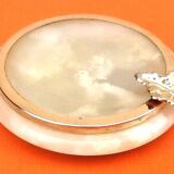 1970s Onyx ashtray with a gold metal rim.