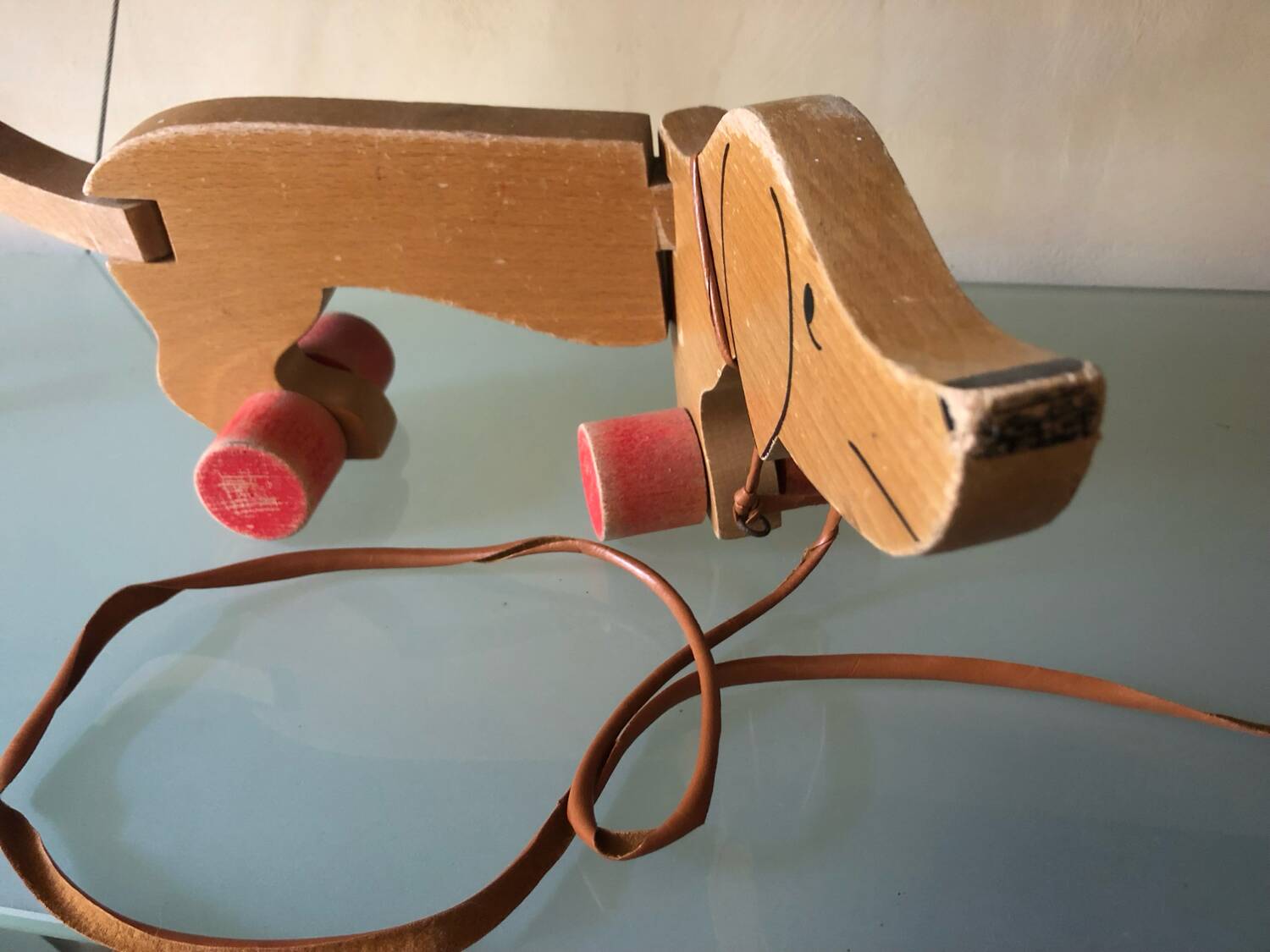 Wooden pull-along dog toy