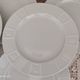 Set of 7 flat plates in white Limoges porcelain geometric decoration in relief