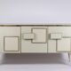 Geometric sideboard in glass and gilded brass. Contemporary Italian work.